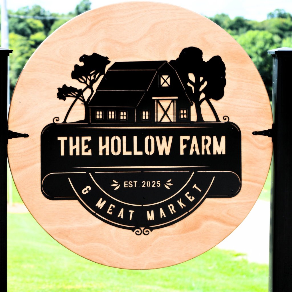 The Hollow Farm & Meat Market sign at the farm entrance